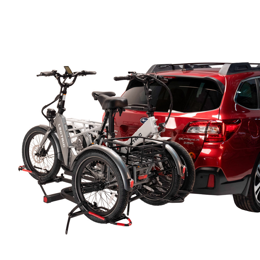 Lectric XP Trike and a Lectric Xpedition on a bike rack attached to an SUV