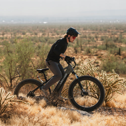 riding Lectric eBike in desert mountains